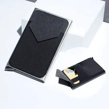 Load image into Gallery viewer, RFID Black Magic Trifold Vegan Leather Wallet with card compartments displayed on a white surface, sleek and compact design
