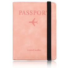 Load image into Gallery viewer, Pink leather passport holder and travel wallet with RFID-blocking technology for secure travel and identity protection.
