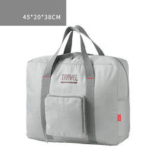 Load image into Gallery viewer, Grey foldable canvas travel bag with large capacity and dimensions 45x20x38cm for men and women.
