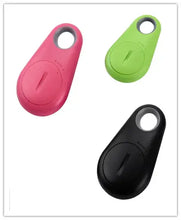 Load image into Gallery viewer, Colorful eThings Smart Mini GPS Trackers in pink, green, and black for tracking valuables, pets, and loved ones
