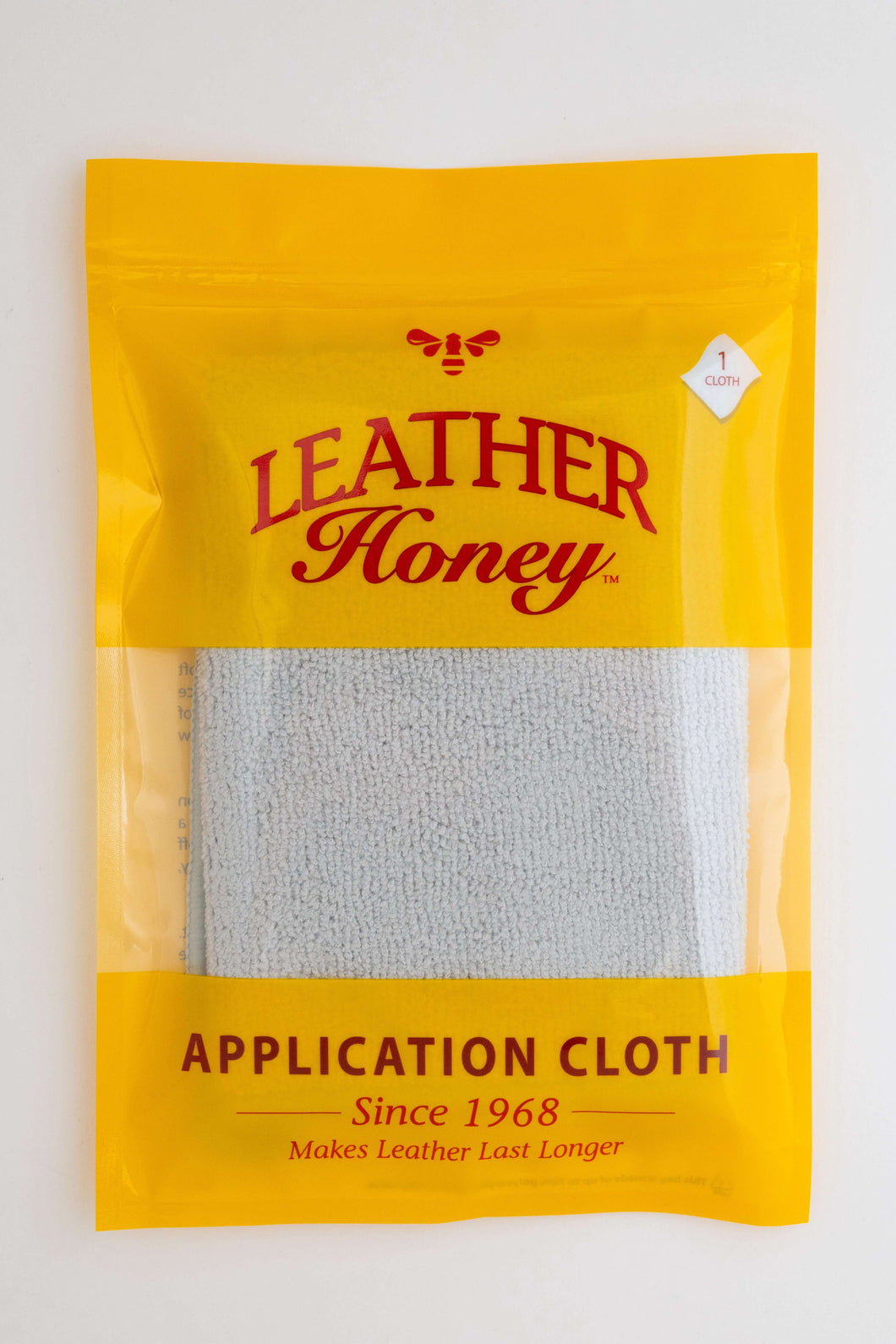 Lint-Free Application Cloth in yellow Leather Honey packaging for leather cleaning and conditioning, lint-free and smooth application.