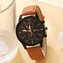 Cargar imagen en el visor de la galería, Luxury men&#39;s brown leather quartz wristwatch with sleek design on display
