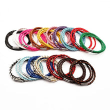 Load image into Gallery viewer, Colorful PU braided leather bracelets in vibrant multicolor patterns, perfect vegan accessories for fashion-forward looks.
