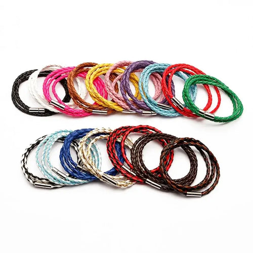 Colorful PU braided leather bracelets in vibrant multicolor patterns, perfect vegan accessories for fashion-forward looks.