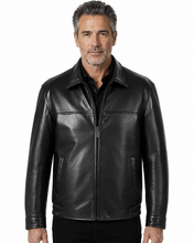 Load image into Gallery viewer, A man wearing a black leather jacket with a front zipper, stand-up collar, and zippered side pockets, photographed against a plain white studio background.
