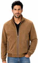 Load image into Gallery viewer, A man wearing a brown suede zip-up jacket over a black t-shirt and blue jeans, photographed against a solid white background.

