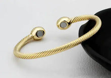 Load image into Gallery viewer, Gold twisted magnetic therapy bracelet with open design
