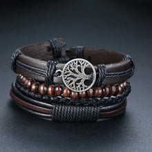 Load image into Gallery viewer, Stylish braided leather bracelet with tree charm and wooden beads, emphasizing craftsmanship and sophistication for a bold look.
