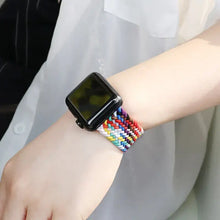 Load image into Gallery viewer, Colorful nylon elastic strap for Apple Watch on wrist, compatible with Series SE/7/6/5/4/3/2/1, shown in a vibrant design.
