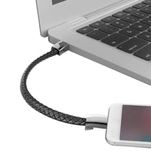Charger l&#39;image dans la galerie, Portable vegan leather phone data cable connected to laptop and phone, showcasing sleek design and functionality for tech enthusiasts.
