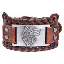 Load image into Gallery viewer, Vintage wide leather woven bracelet with intricate wolf head centerpiece, symbolizing strength and independence; ideal for bold style.
