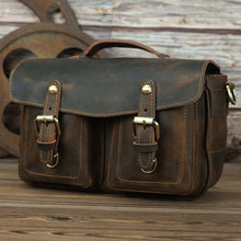 Load image into Gallery viewer, The Faust Leather Camera Bag | Crossbody Vintage Camera Messenger Bag in full-grain leather on rustic background.
