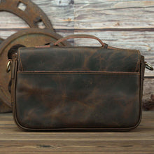 Load image into Gallery viewer, The Faust Leather Camera Bag | Crossbody Vintage Camera Messenger Bag shown from the back, highlighting handcrafted full-grain leather.

