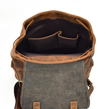 Load image into Gallery viewer, Open view of The Hagen Backpack | Vintage Leather Backpack with spacious main compartment and pockets for versatile use.
