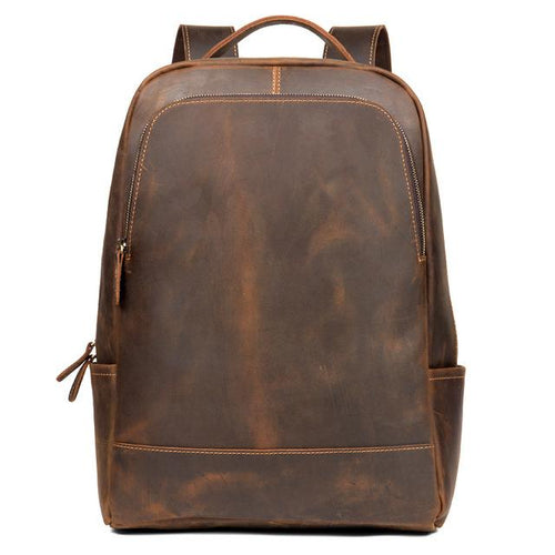 The Vernon Backpack | Genuine Vintage Leather Minimalist Backpack with exterior pocket, perfect for carrying a 15” laptop.
