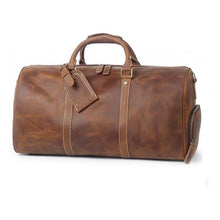 Load image into Gallery viewer, The Dagny Weekender | Large Leather Duffle Bag in brown full-grain leather with multiple interior pockets, ideal for stylish travel.
