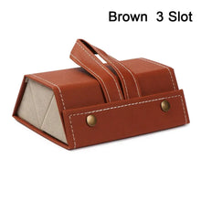 Cargar imagen en el visor de la galería, Brown 3-slot portable eyeglasses storage case in PU leather with a handle and button accents for stylish and secure eyewear storage.
