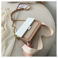 Load image into Gallery viewer, Stylish designer leather crossbody shopping bag with beige and white details, perfect for fashion-forward retail therapy.
