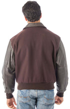Load image into Gallery viewer, Back view of a man wearing a REED leather varsity bomber jacket in brown wool with black leather sleeves, showcasing a classic style.
