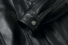 Load image into Gallery viewer, Close-up of REED Men&#39;s American Style Bomber Genuine Leather Jacket cuff detailing, showcasing premium genuine leather texture and sleek design.
