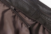 Load image into Gallery viewer, Close-up of REED men&#39;s bomber jacket showcasing genuine leather texture with detailed zippers and lining.
