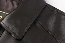 Load image into Gallery viewer, Close-up of REED Men&#39;s American Style Bomber Jacket in genuine leather, highlighting durable stitching and luxurious material.

