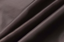 Load image into Gallery viewer, Close-up of smooth, luxurious brown genuine leather fabric folds
