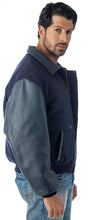 Load image into Gallery viewer, Man wearing REED leather varsity bomber jacket with wool body, top grain leather sleeves, and collar, made in USA.

