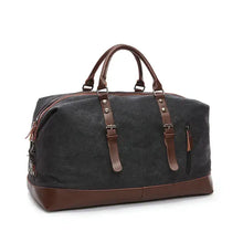 Load image into Gallery viewer, Retro large capacity unisex canvas travel bag with leather accents, perfect for stylish leisure travel, 20-35L capacity.
