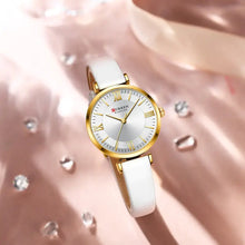 Load image into Gallery viewer, Elegant Classic Clock Leather Watch with golden clockface, quartz movement, water-resistant design, and white leather strap for women.
