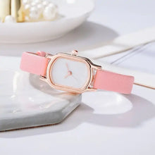 Load image into Gallery viewer, Oval Dial Retro Watch with pink strap and vintage-inspired design, showcasing timeless elegance and sophistication on a white surface.

