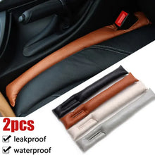 Load image into Gallery viewer, PU leather pad seat leakproof filler for car gaps, 2-piece set, shown in black, brown, beige, and gray. Prevents items from falling.
