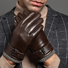 Load image into Gallery viewer, Man wearing stylish men&#39;s winter leather gloves with cashmere lining, showcasing warmth and sophistication in cold weather fashion.
