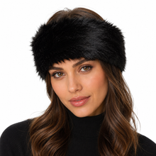 Charger l'image dans la galerie, A woman wearing a thick, fluffy black faux fur headband against a solid white background.
