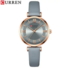 Load image into Gallery viewer, Classic Clock Leather Watch for women with elegant grey leather strap and gold-tone clockface, featuring water-resistant quartz movement.
