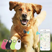 Load image into Gallery viewer, Golden retriever wearing Pet Smart GPS Tracker running in park with smartphone app display and multiple tracker color options
