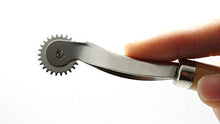 Load image into Gallery viewer, eZthings Professional Stitch Marking Spacer for leather and arts crafting held in hand, perfect for precision creative projects.
