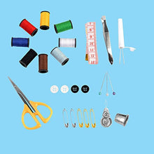 Load image into Gallery viewer, eZthings DIY sewing set with threads, scissors, measuring tape, and more on blue background for arts and crafts projects.
