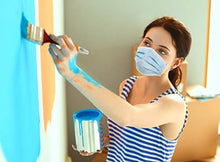 Load image into Gallery viewer, Woman painting wall wearing eZthings Professional Crafts Face Mask Cover for arts and crafts protection, soft and comfortable fit.
