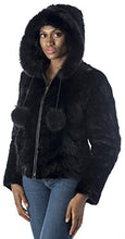 Load image into Gallery viewer, Woman wearing REED Women&#39;s Genuine Mink Fur Bomber Jacket, 100% real fur, with hood and pom-poms, luxurious black design.
