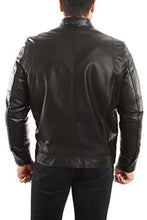 Load image into Gallery viewer, Back view of a man wearing a black REED lambskin leather biker jacket with zipped pockets, showcasing premium leather quality.
