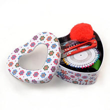Load image into Gallery viewer, Heart-shaped sewing kit with assorted sewing supplies and colorful floral design.
