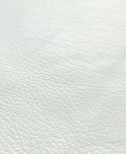 Load image into Gallery viewer, Close-up of white creamy lambskin leather hide showcasing its buttery soft and smooth texture.
