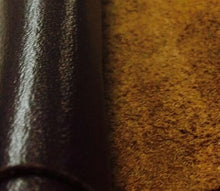 Charger l&#39;image dans la galerie, Close-up of chrome tanned cow leather hides in various colors, featuring a smooth and textured finish ideal for leather crafts.
