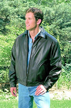 Load image into Gallery viewer, Man wearing REED Men&#39;s All American Bomber Leather Jacket in a garden setting, showcasing premium USA-made quality, style, and durability.
