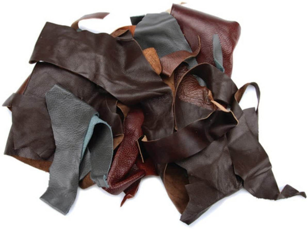 Assorted black leather scraps, 2-lb pack for crafts; ideal for wallets and jewelry, diverse shapes and sizes from garment cutting.