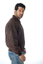 Load image into Gallery viewer, Model wearing REED Men&#39;s Baseball Suede Leather Jacket, crafted from imported suede, ideal for fall and spring, stylish and durable.
