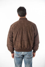Load image into Gallery viewer, Back view of a man wearing a REED men&#39;s baseball suede leather jacket with satin lining, perfect for fall and spring.
