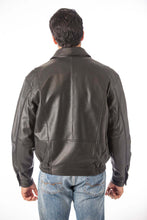 Load image into Gallery viewer, Back view of man wearing REED Men&#39;s New Zealand Lambskin Leather Jacket in black, showcasing soft-touch lambskin material.
