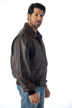 Load image into Gallery viewer, REED Men&#39;s Bomber Leather Jacket, Union Made in USA, Classic Style, Durable Naked Cow Leather, Model Wearing Jacket Side View
